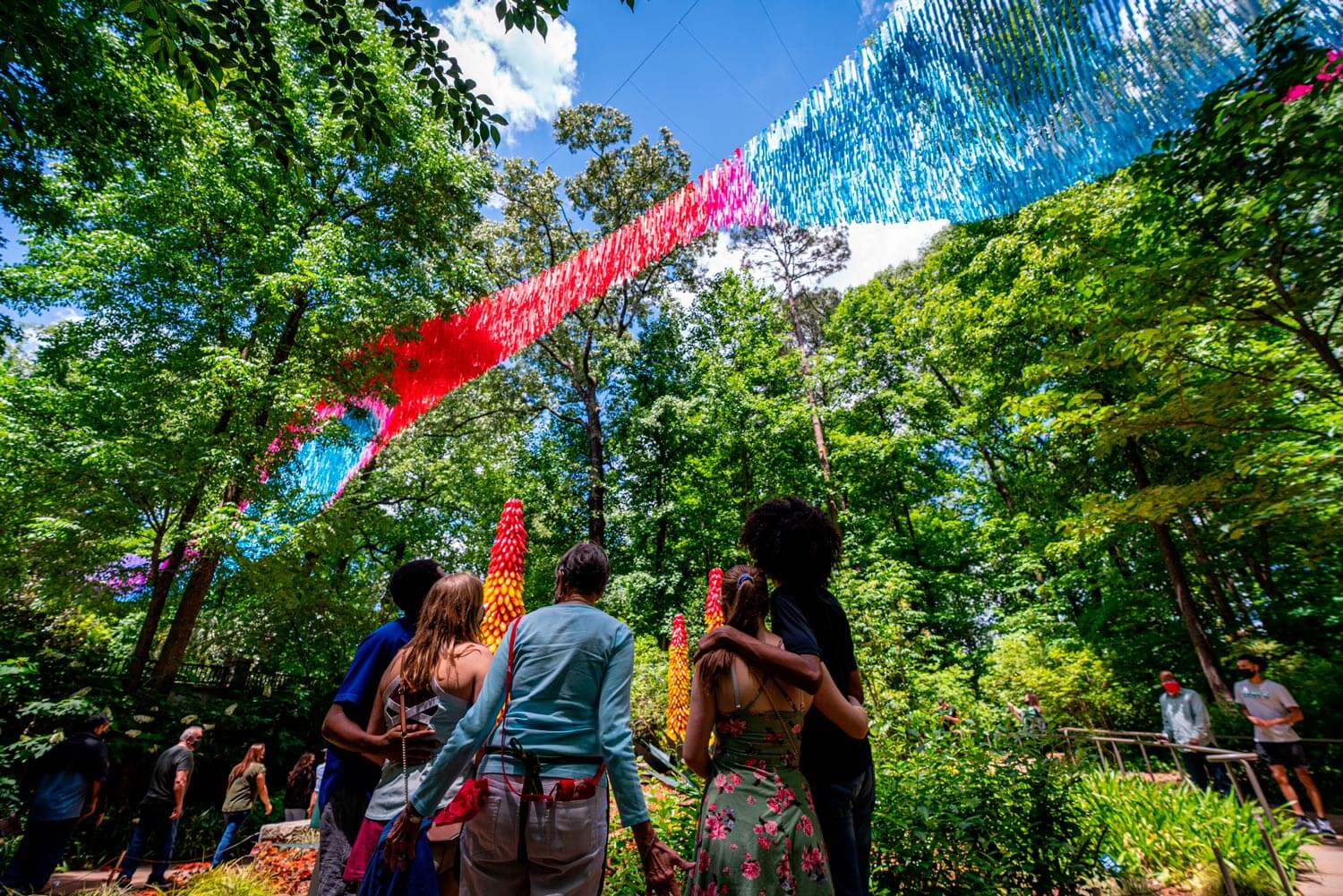 People admiring Dream Flora at Atlanta Botanical Garden.
